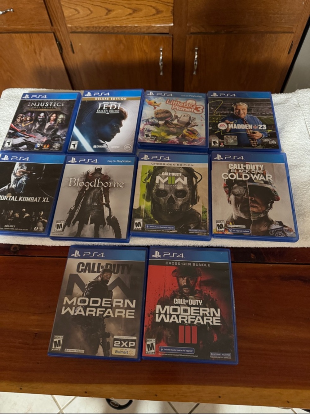 Sony PS4 Game Bundle with Blue Cases - Mixed Titles Lot of 10